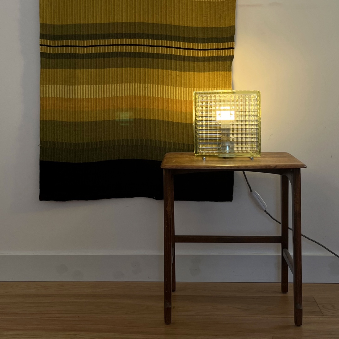 Brutalist glass brick lamp turned on