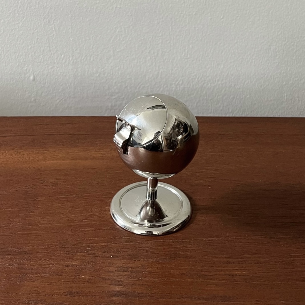 Postmodern spherical chrome ashtray closed