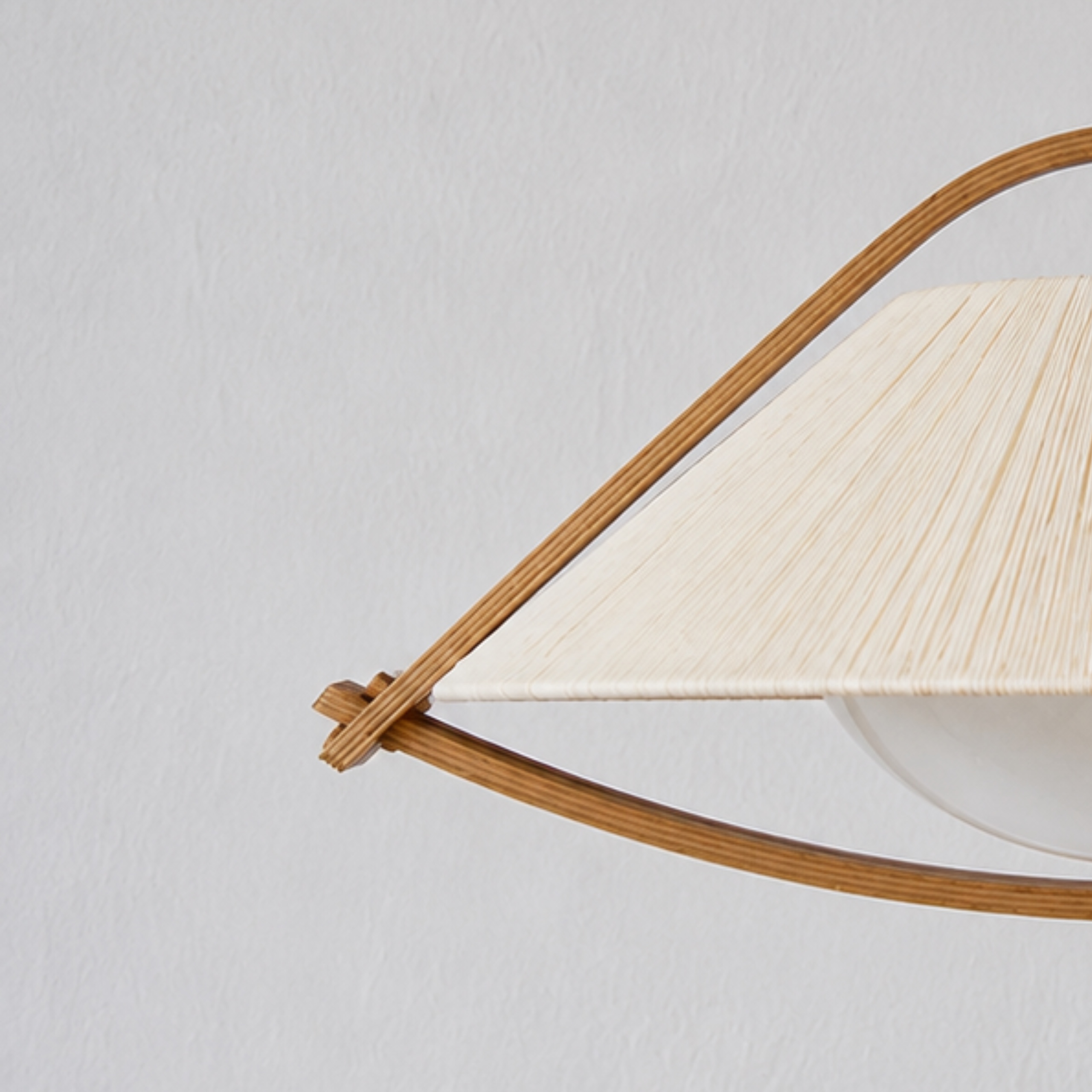Bent teak and sisal webbing detail